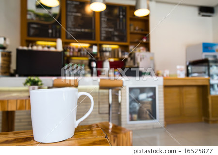 Coffee cup on table in cafe Coffee cup on table in cafe 16525877