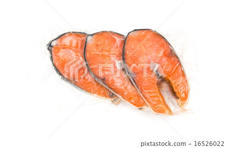 Frozen salmon fillets in a vacuum package 16526022