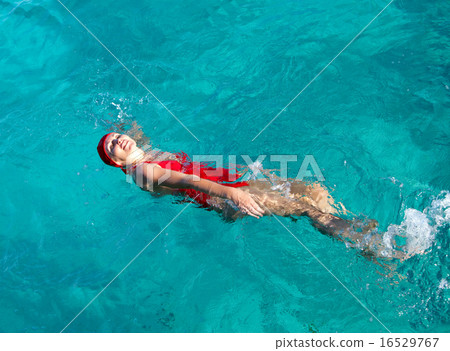 The sports girl swims in the sea The sports girl swims in the sea 16529767