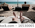 Relaxing at the beach 16530065