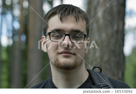 portrait of young man in glasses with a beard portrait of young man in glasses with a beard 16533092