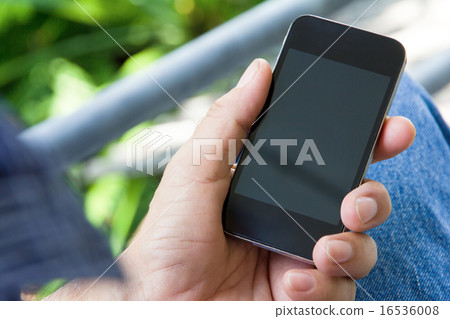 older man checking his phone older man checking his phone 16536008