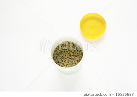 Food of granular goldfish in a container 16536687