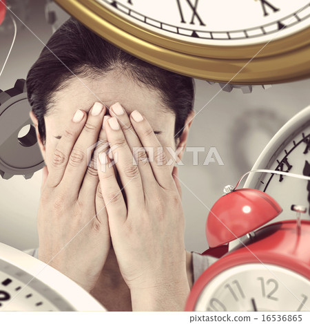 Composite image of sad woman hiding her face 16536865