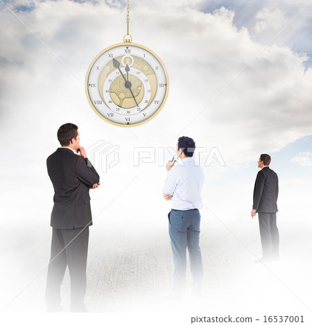 Composite image of handsome businessman looking Composite image of handsome businessman looking 16537001