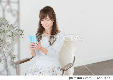 Smartphone · Young lady Smartphone · Young lady 16539153