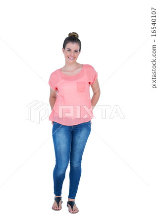 Happy pretty casual brunette looking at camera 16540107
