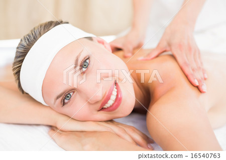 Beautiful blonde enjoying a massage Beautiful blonde enjoying a massage 16540763