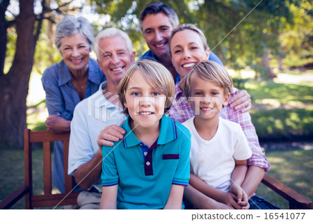 Happy family in the park Happy family in the park 16541077