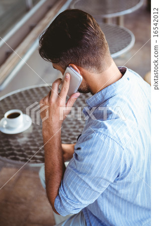 Attentive businessman on the phone Attentive businessman on the phone 16542012