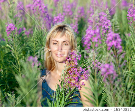 happy young woman in flowers blooming sally happy young woman in flowers blooming sally 16543855