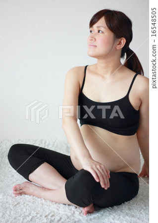 One woman (Yoga belly fetus maternity pregnancy pregnant premature pregnancy prenatal life maternal mother) One woman (Yoga belly fetus maternity pregnancy pregnant premature pregnancy prenatal life maternal mother) 16548505