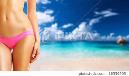 Woman on beautiful beach at Seychelles 16550695