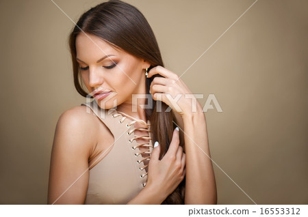 Beautiful young healthy woman is very shy Beautiful young healthy woman is very shy 16553312