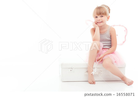 Pretty little girl sitting on case Pretty little girl sitting on case 16558071