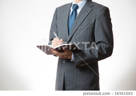 檢查日程安排的商人 檢查日程安排的商人 16561083