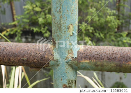 Rusted steel pipe railings 16565661