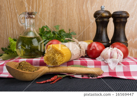 spaghetti and ingredients for seasoning spaghetti and ingredients for seasoning 16569447