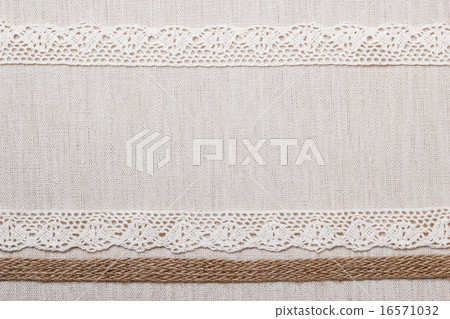 Lace frame on linen cloth background 16571032
