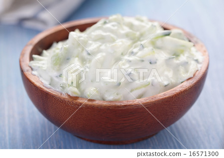 Tzatziki in a wooden bowl 16571300