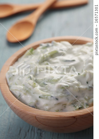 Tzatziki in a wooden bowl 16571301