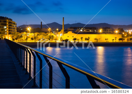Pier at beach of Badalona in evening Pier at beach of Badalona in evening 16580324