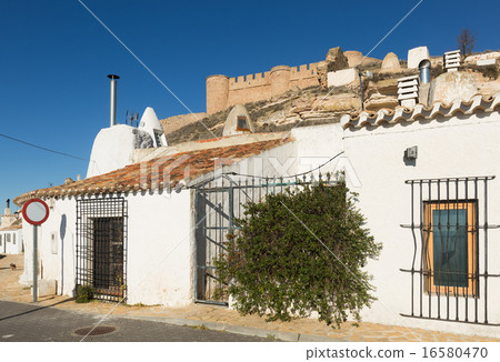 Dwelling caves into mount. Chinchilla de Monte-Aragon Dwelling caves into mount. Chinchilla de Monte-Aragon 16580470