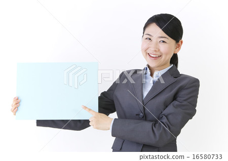 A woman with a blue board 16580733