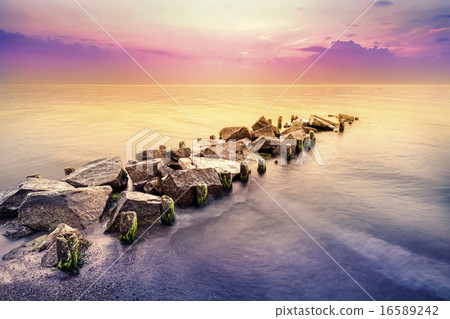Golden hour, peaceful sea landscape after sunset. Golden hour, peaceful sea landscape after sunset. 16589242
