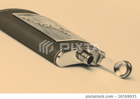 Stainless hip flask isolated on white background 16589935