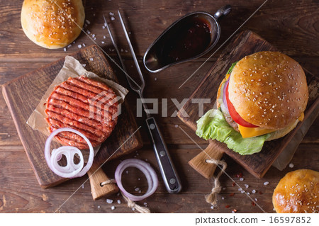 Burger and raw cutlet 16597852