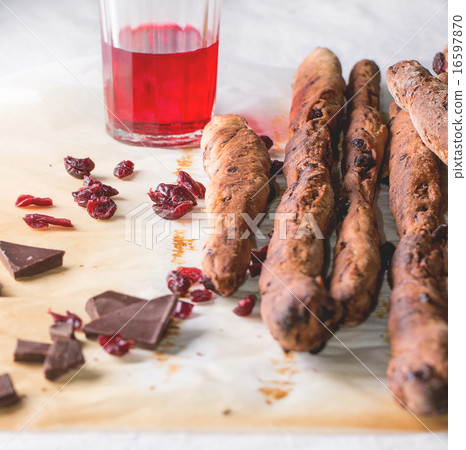 Grissini bread and red liqueur Grissini bread and red liqueur 16597870