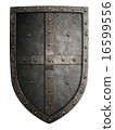 Big medieval crusader's metal shield isolated 16599556