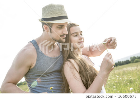 Young couple in love outdoor at the sunset Young couple in love outdoor at the sunset 16600675