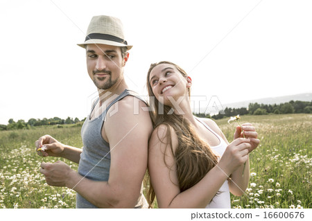 Young couple in love outdoor at the sunset Young couple in love outdoor at the sunset 16600676