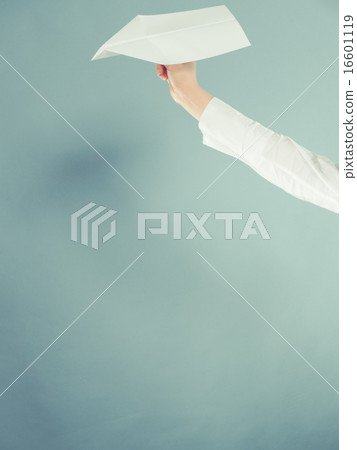 Woman holding airplane in hand. 16601119