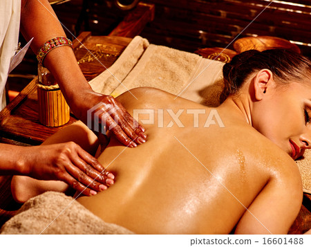 Woman having Ayurvedic spa treatment. 16601488