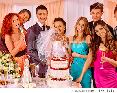 Group people at wedding singing song. 16601513