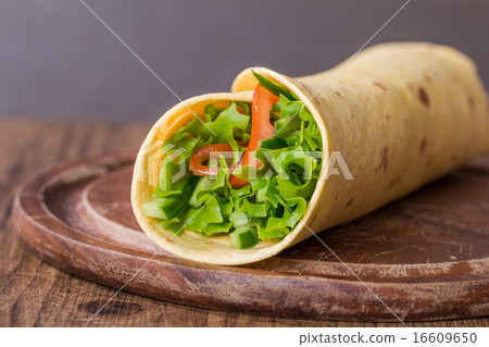 fresh tortilla wrap with vegetables 16609650