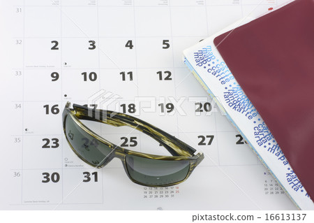 Sunglasses, tickets and calendar 16613137