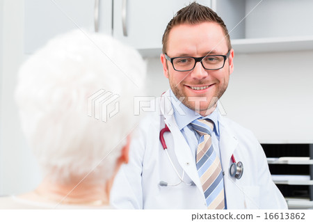 Doctor seeing senior patient in practice 16613862