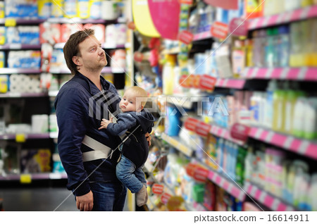 Father and his son at supermarket Father and his son at supermarket 16614911