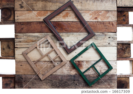 Empty wooden frame hang on wooden hall Empty wooden frame hang on wooden hall 16617309