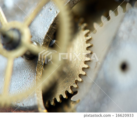 background with metal cogwheels a clockwork. macro 16620933