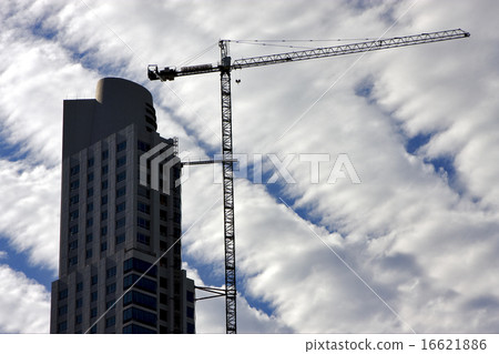 skyscraper clouds and crane skyscraper clouds and crane 16621886