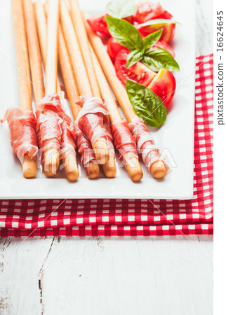 Grissini with prosciutto Grissini with prosciutto 16624645