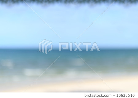 Sandy beach sea sky and tree frame blur background Sandy beach sea sky and tree frame blur background 16625516