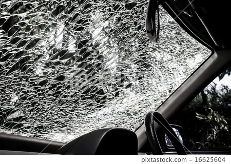 Damaged glass (car windshield) inside car 16625604