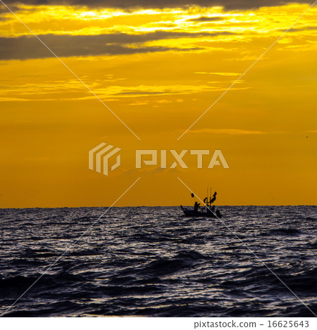 silhouette of fishermen with thier boats fishing 16625643