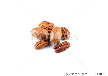 Few pecan nuts isolated on white Few pecan nuts isolated on white 16634092